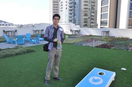 Khongor Enkhbold at Twitter headquarters. Note the logoed lawn game and color-coordinated deck furniture.