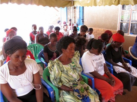 Ugandan women meditate together