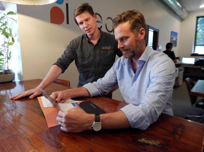 Ideal Energy CEO Troy Van Beek with account manager Michael Halley